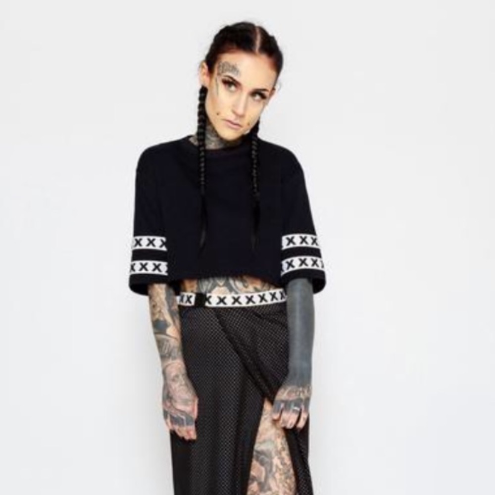 black crop top with white trim detail